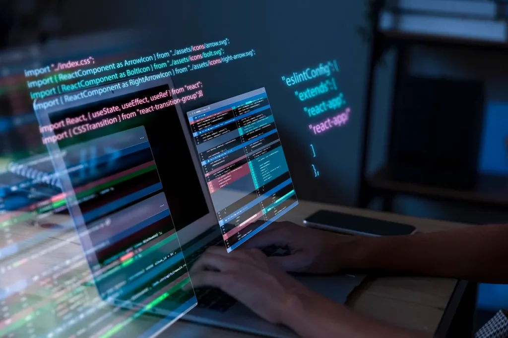 Desenvolvedor escrevendo código em laptop com interface de programação visível, mostrando linguagens e frameworks como React.